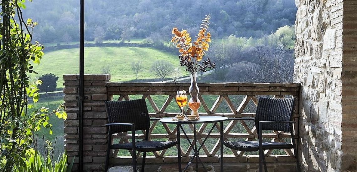 Borgo di Carpiano terrasje bij kamer met prachtig uitzicht op landschap