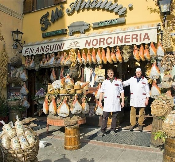 Het culinaire hoogtepunt van je Italië rondreis bevindt zich in Norcia