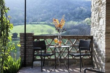 Borgo di Carpiano terrasje bij kamer met prachtig uitzicht op landschap