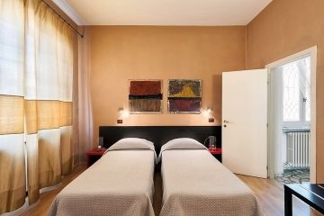 Lucca in Villa Elise tweepersoonskamer met twin bedden
