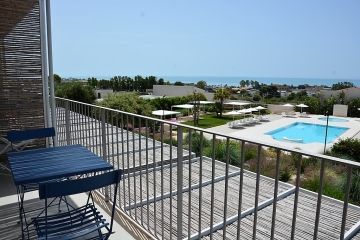 La Scibina uitzicht op zwembad vanaf terras kamer