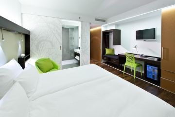 De kamers van hotel i31 zijn strak maar bieden alle comfort