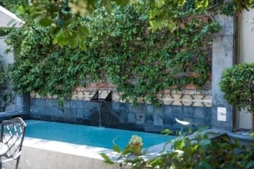 Het rustgevende fonteintje in de tuin als tegenhanger van dynamisch Kaapstad